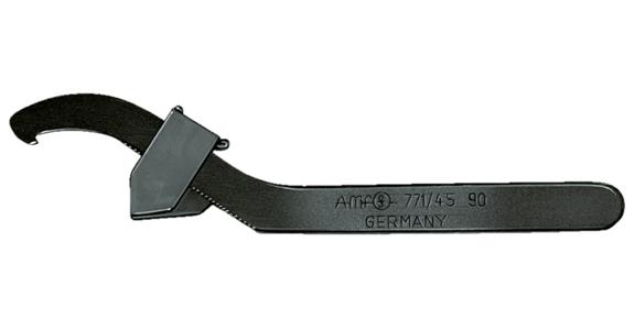 Adjustable hook wrench with lug and serration for nuts dia. 95-165 mm
